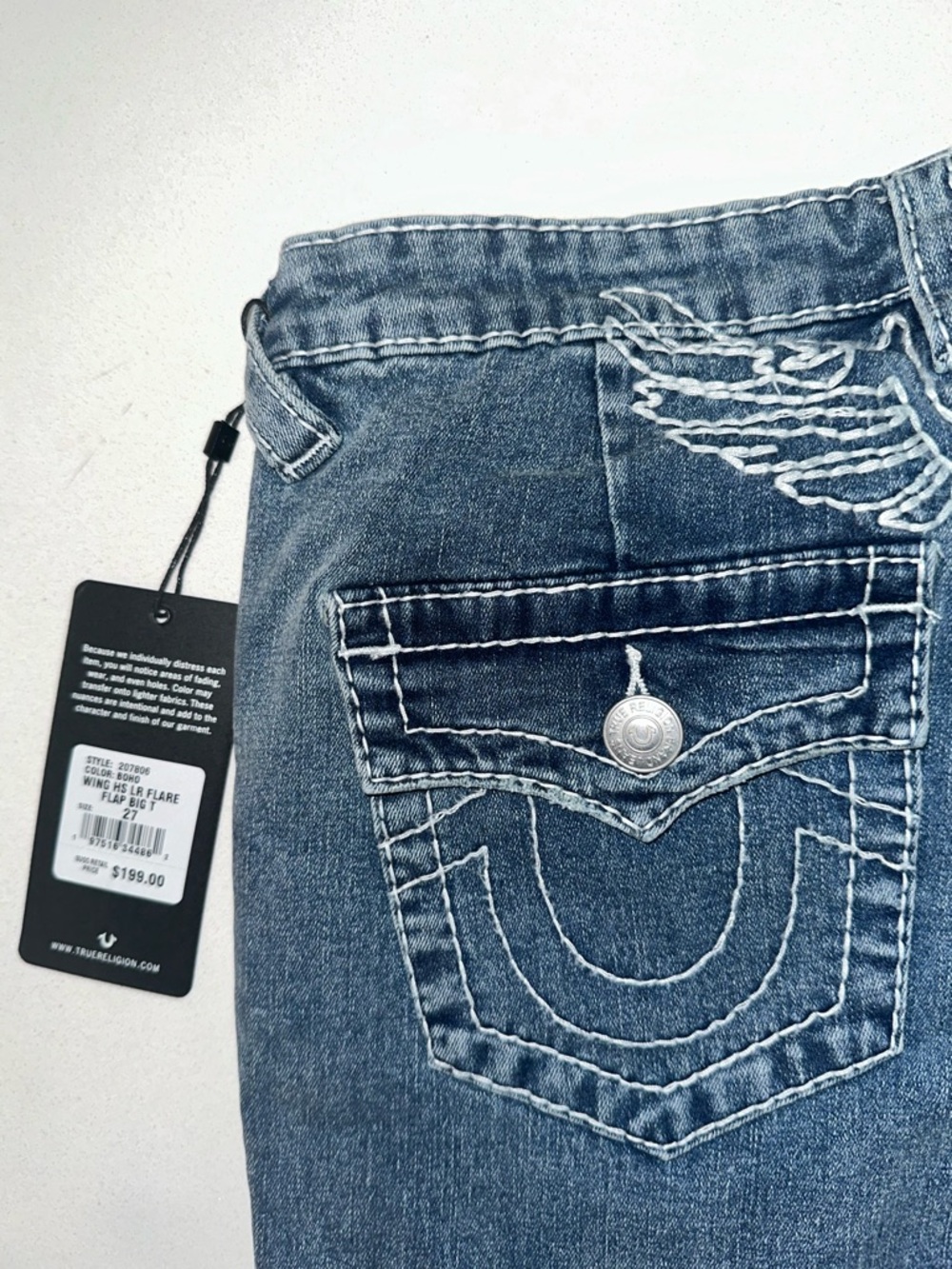 True Religion Mid Blue Flare Jeans with Signature Wing Stitch